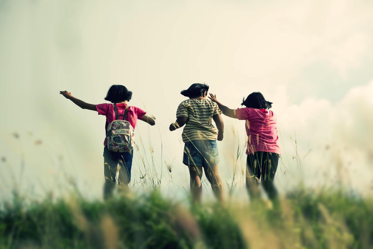 silhouette of a happy children and happy time sunset photo