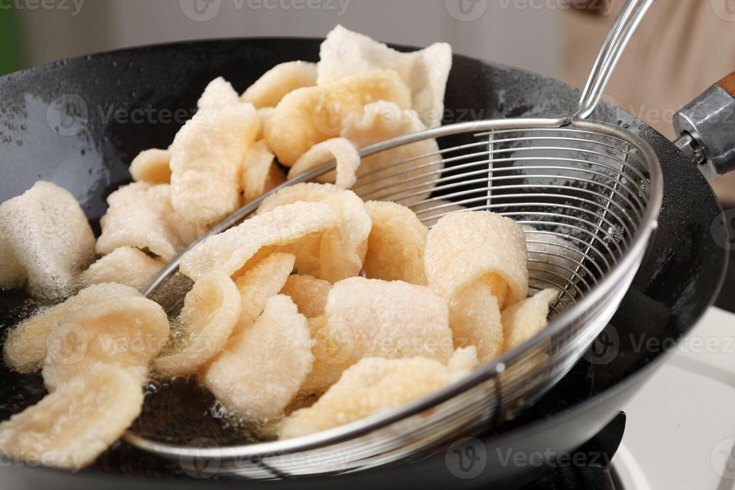 Process Deep Frying Crackers in the Hot Oil photo