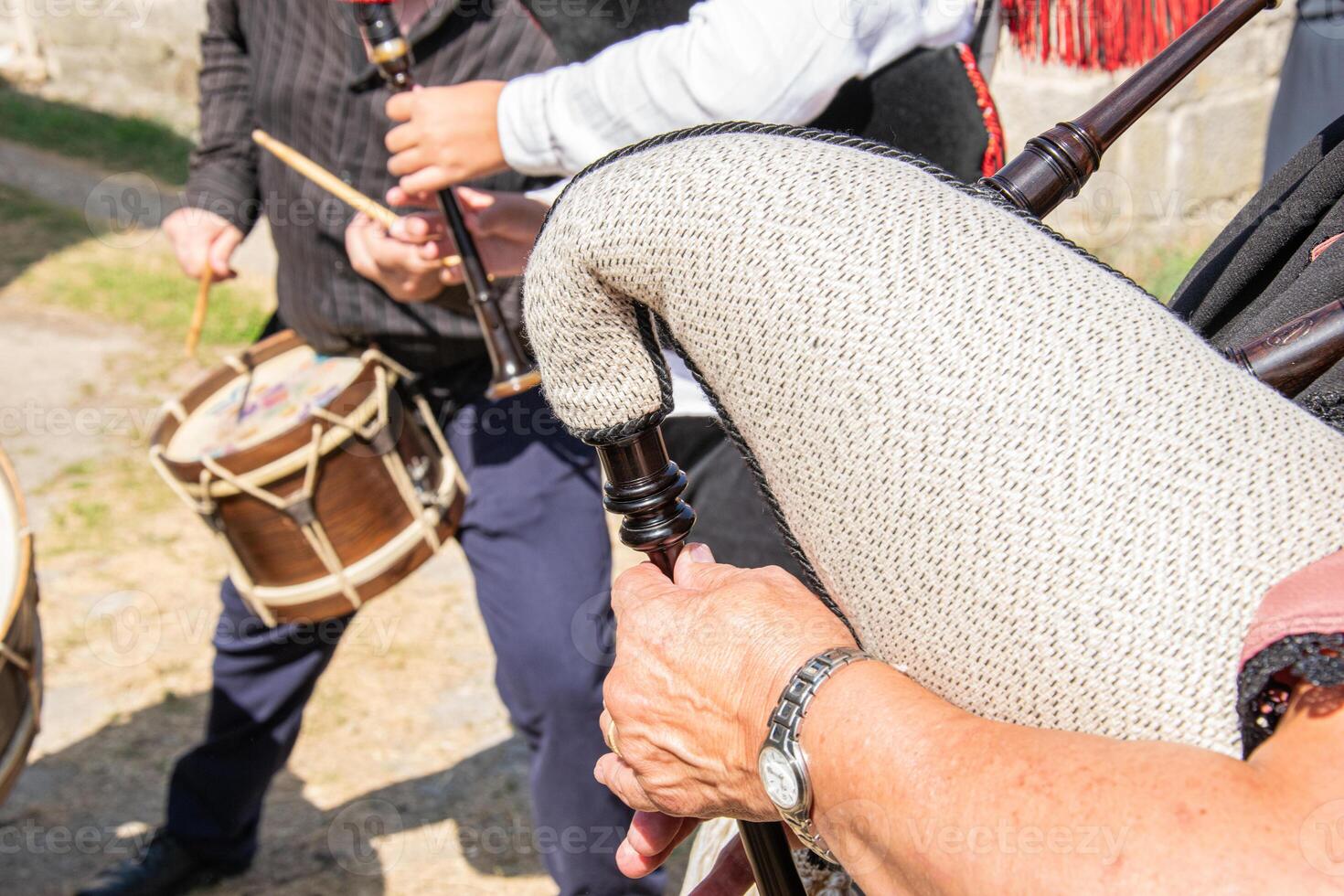 Galician folk band at a traditional celebration, with bagpipes and drums. Galicia culture concept photo