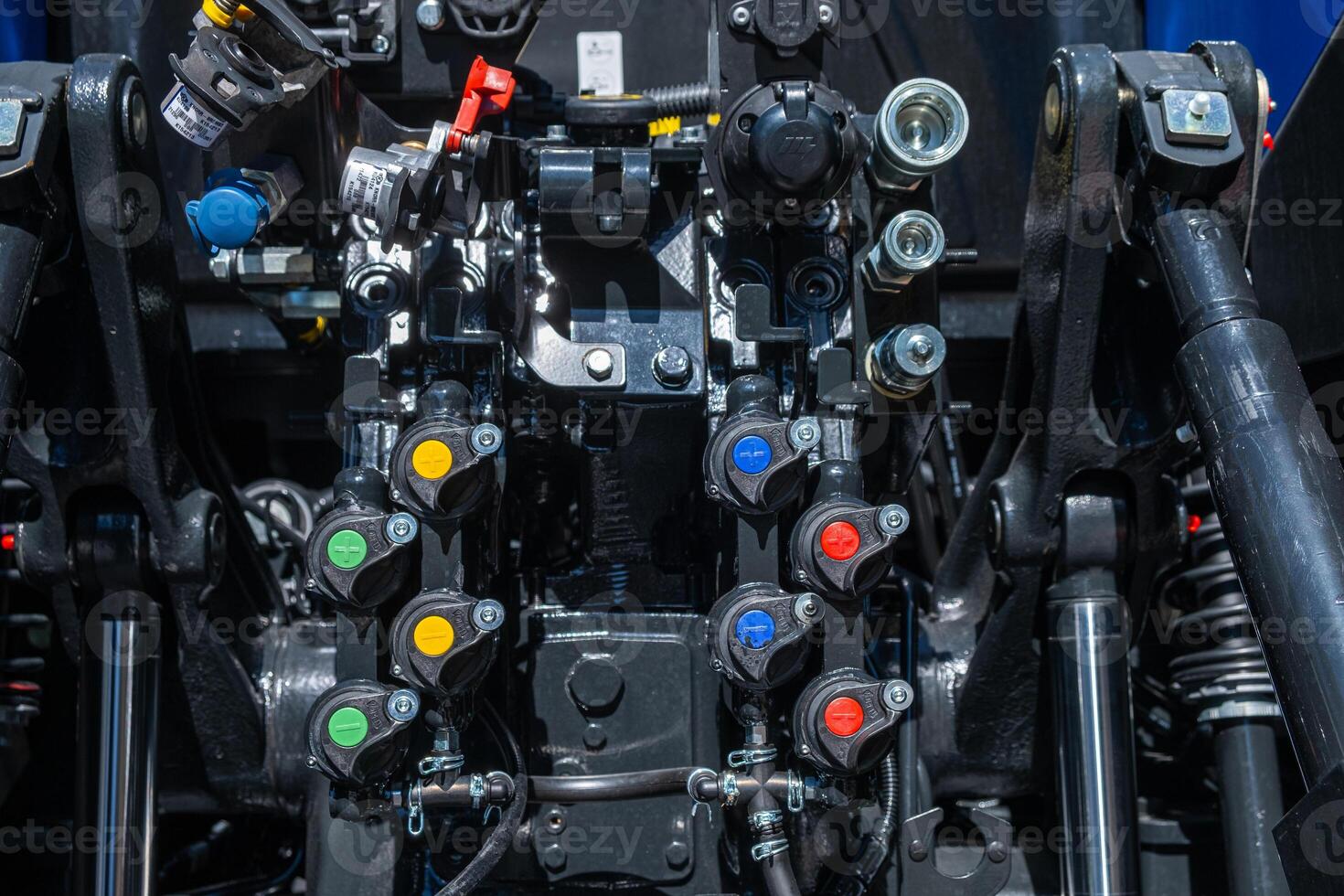 detail of connectors on the rear of a modern tractor, mechanical concept photo
