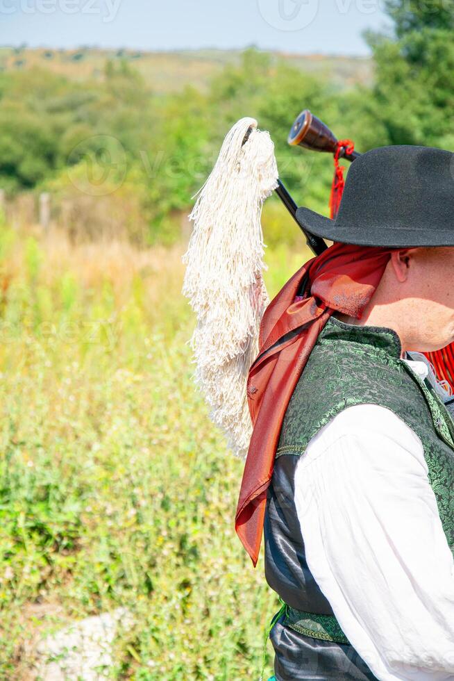 side view of a traditional bagpipe player from Galicia photo