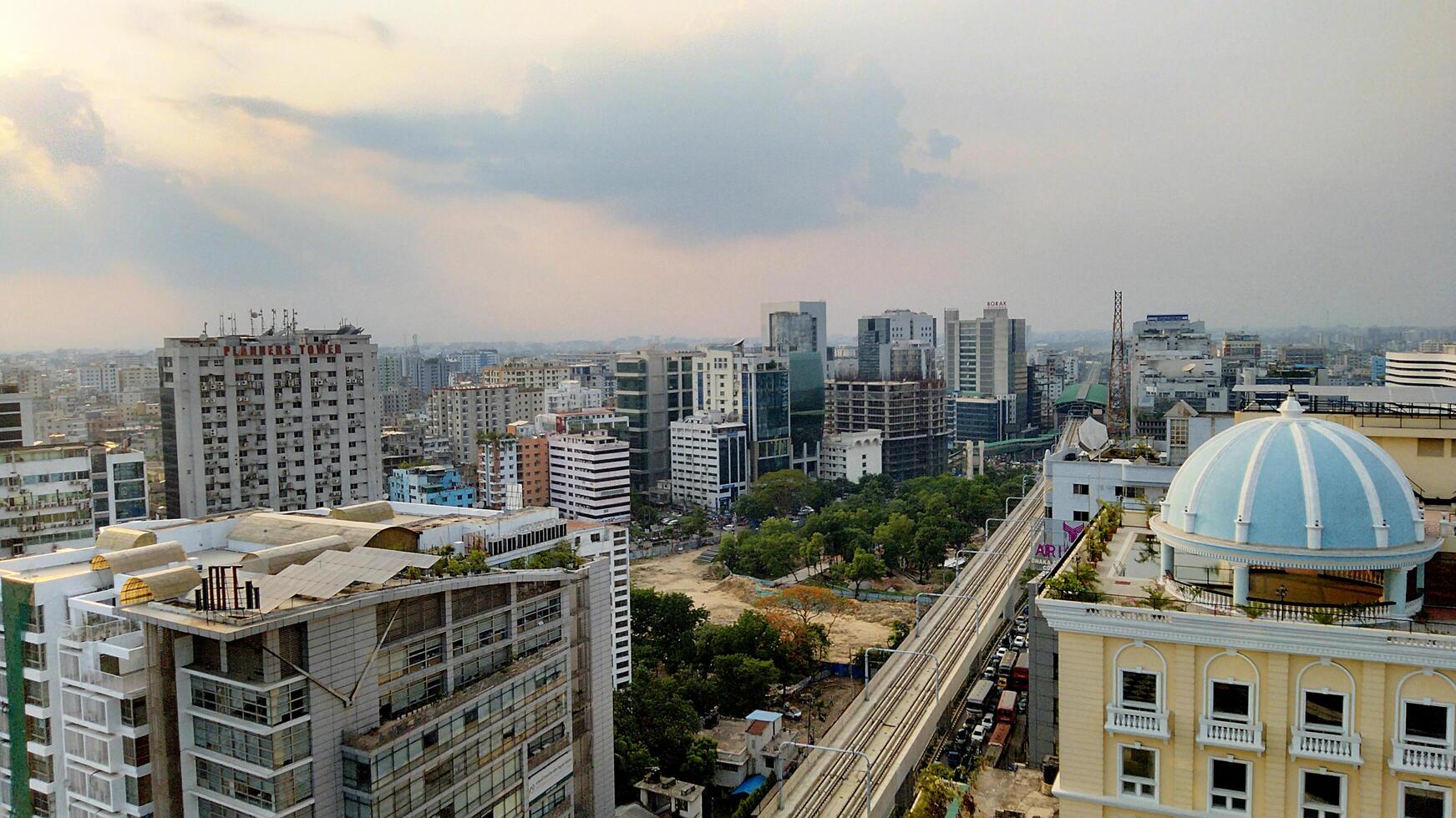 Amazing view of a cityscape with cloudy photo