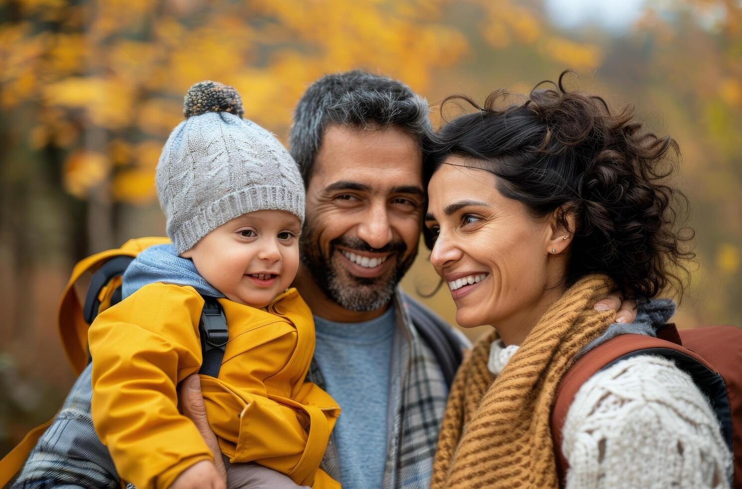 Family Enjoying Autumn Hike in Forest With Child on Father's Back photo
