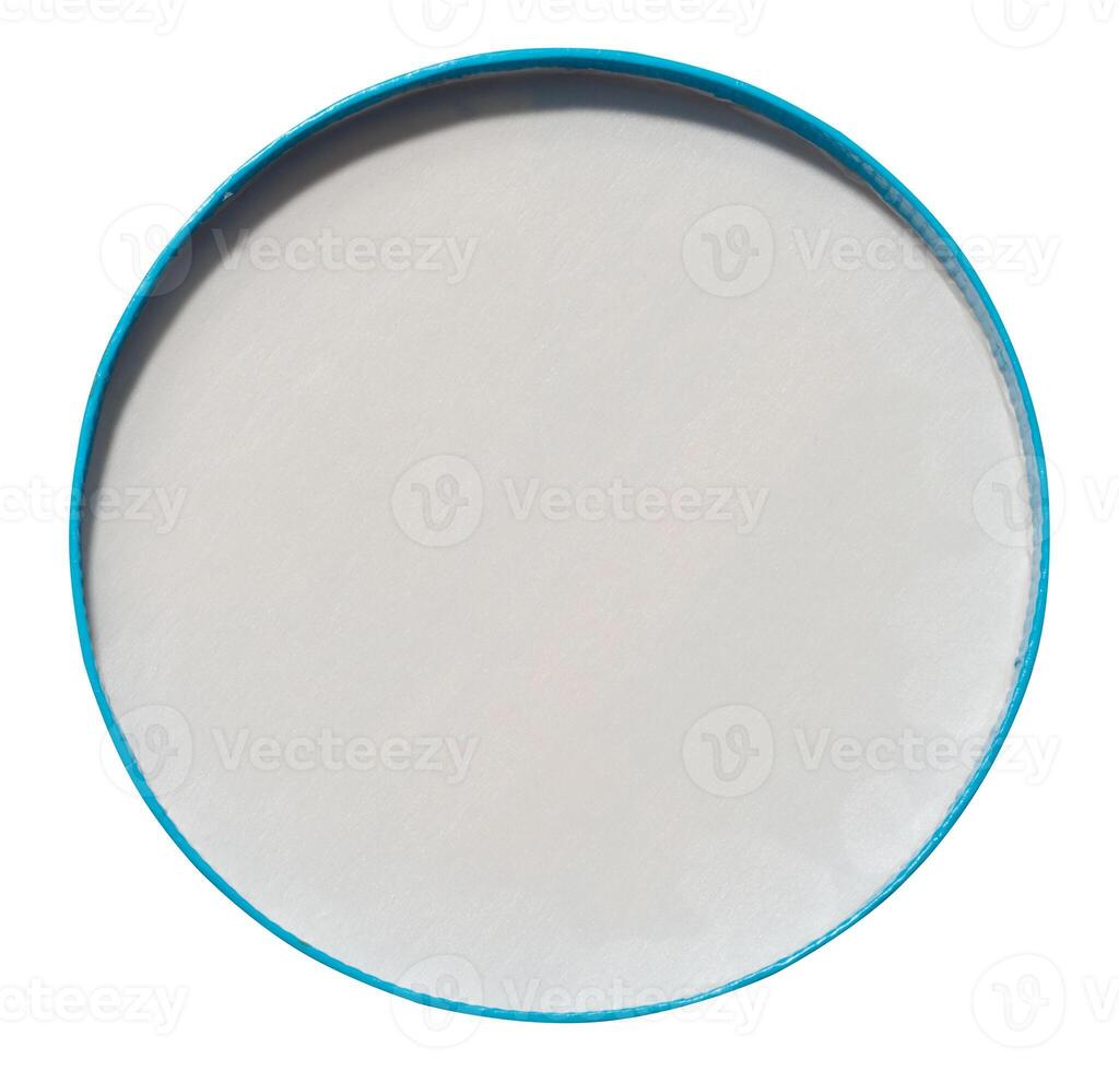 Round paper white lid with blue border on isolated background, top view photo