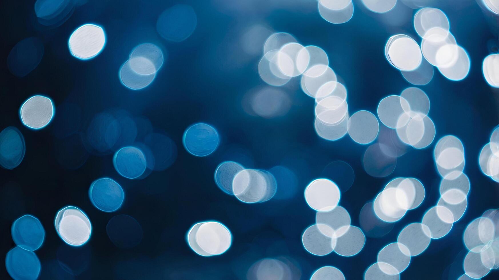 blue lights are shown in a photo of a dark background
