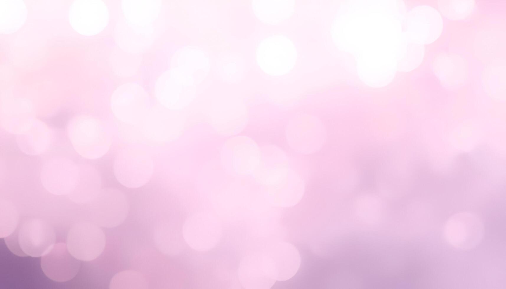 a purple background with a blurred bokeh effect photo