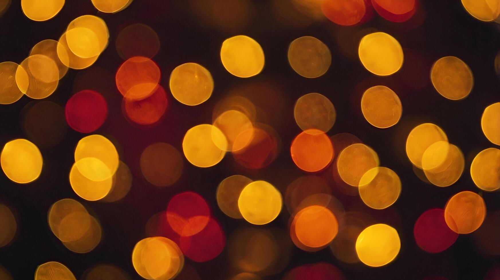 a blurry image of a christmas tree with many lights photo