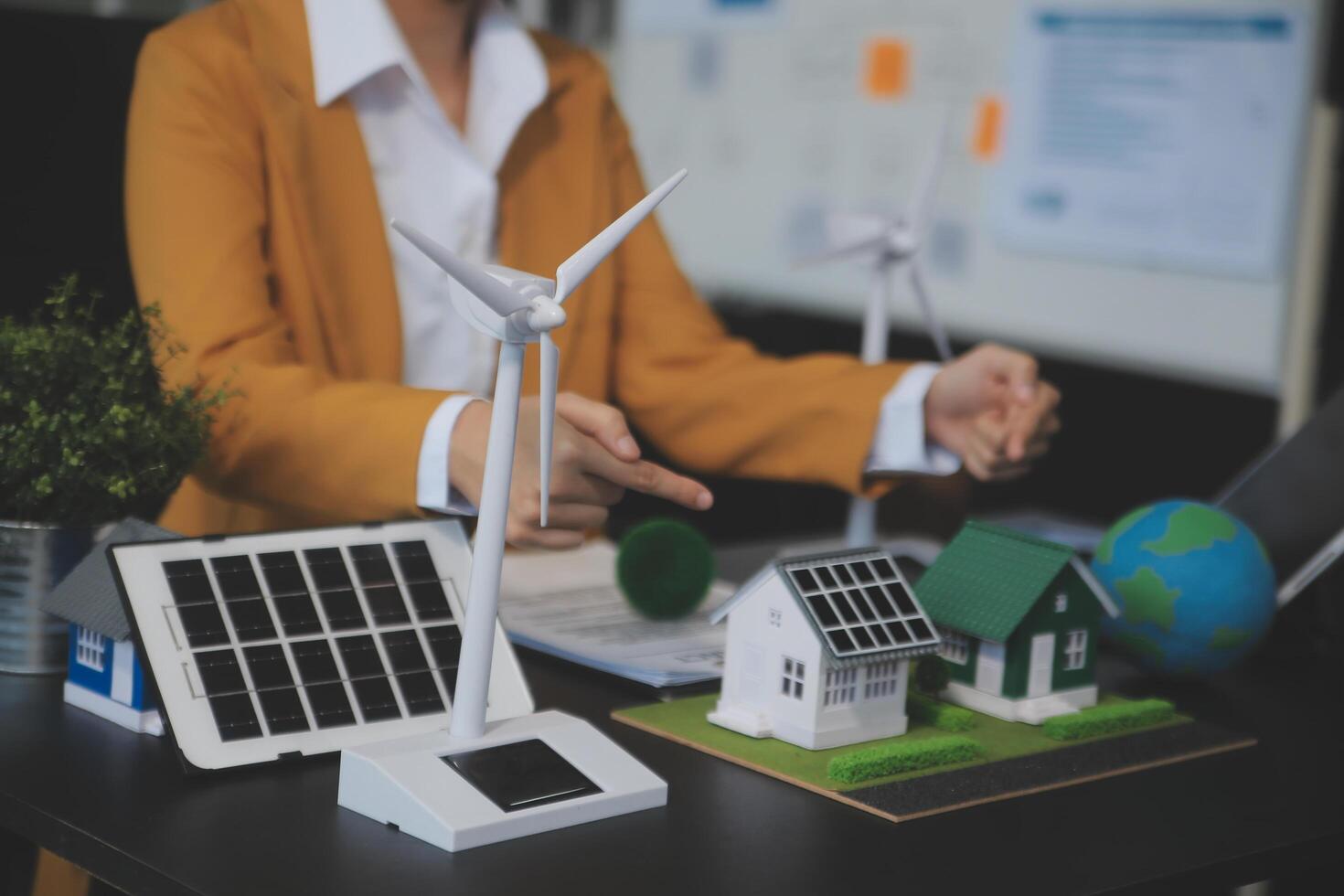 Carbon offset price report CO2 emission. Future growth Net zero waste in ESG ethical SME office protect climate change global warming social issues project. Group of asia people Eco friendly SDGs plan photo