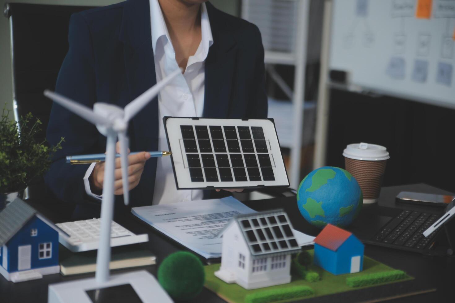 Carbon offset price report CO2 emission. Future growth Net zero waste in ESG ethical SME office protect climate change global warming social issues project. Group of asia people Eco friendly SDGs plan photo