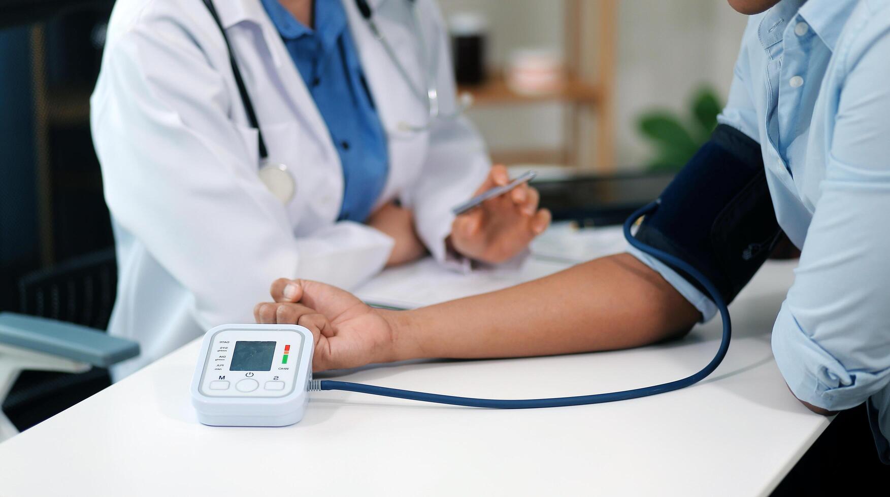 The doctor woman hand use the pulse meter to measure the pressure of the patient, medical checkup concept. photo