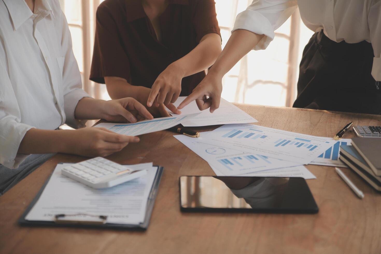 Business meetings to analyze investment strategies and brainstorm sales plans for a more profitable business. photo