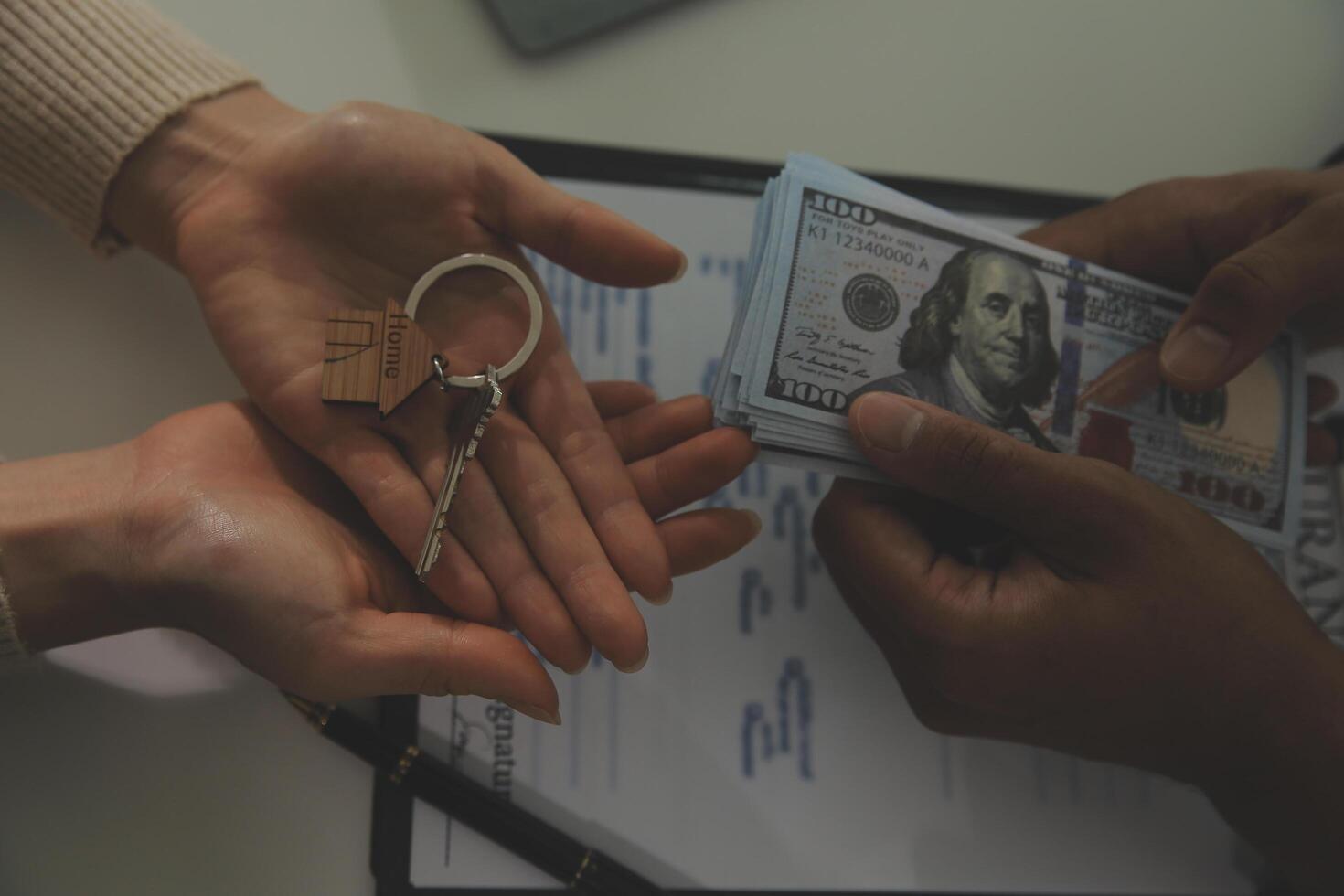 Real estate agent home sales broker is using a pen pointing to the house model and explains the business contract, rent, buy, mortgage, loan, or home insurance photo