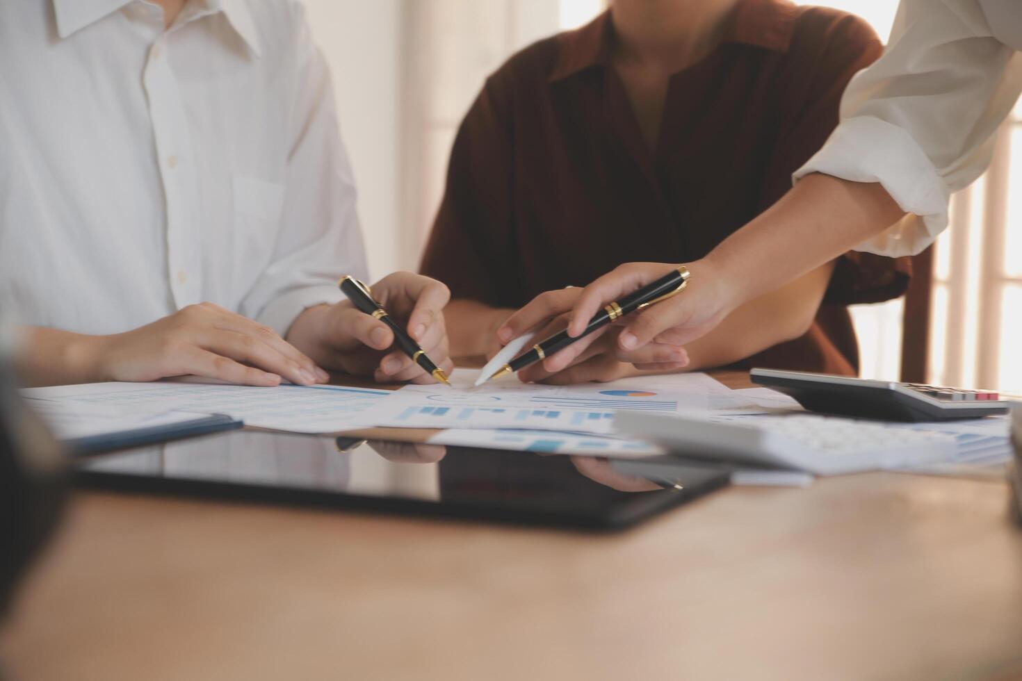 Business meetings to analyze investment strategies and brainstorm sales plans for a more profitable business. photo