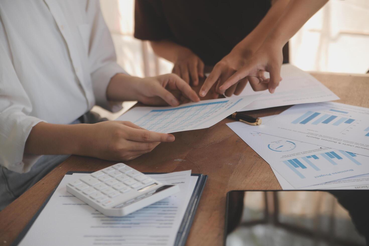 Business meetings to analyze investment strategies and brainstorm sales plans for a more profitable business. photo