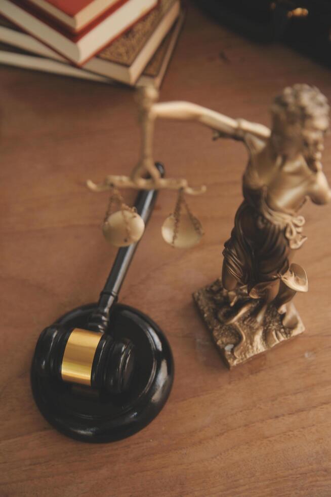 Lawyer, legal advisor, businessman brainstorming information on agreement details Business contracts in legal processing books for accuracy in contract documents. joint financial investment. photo