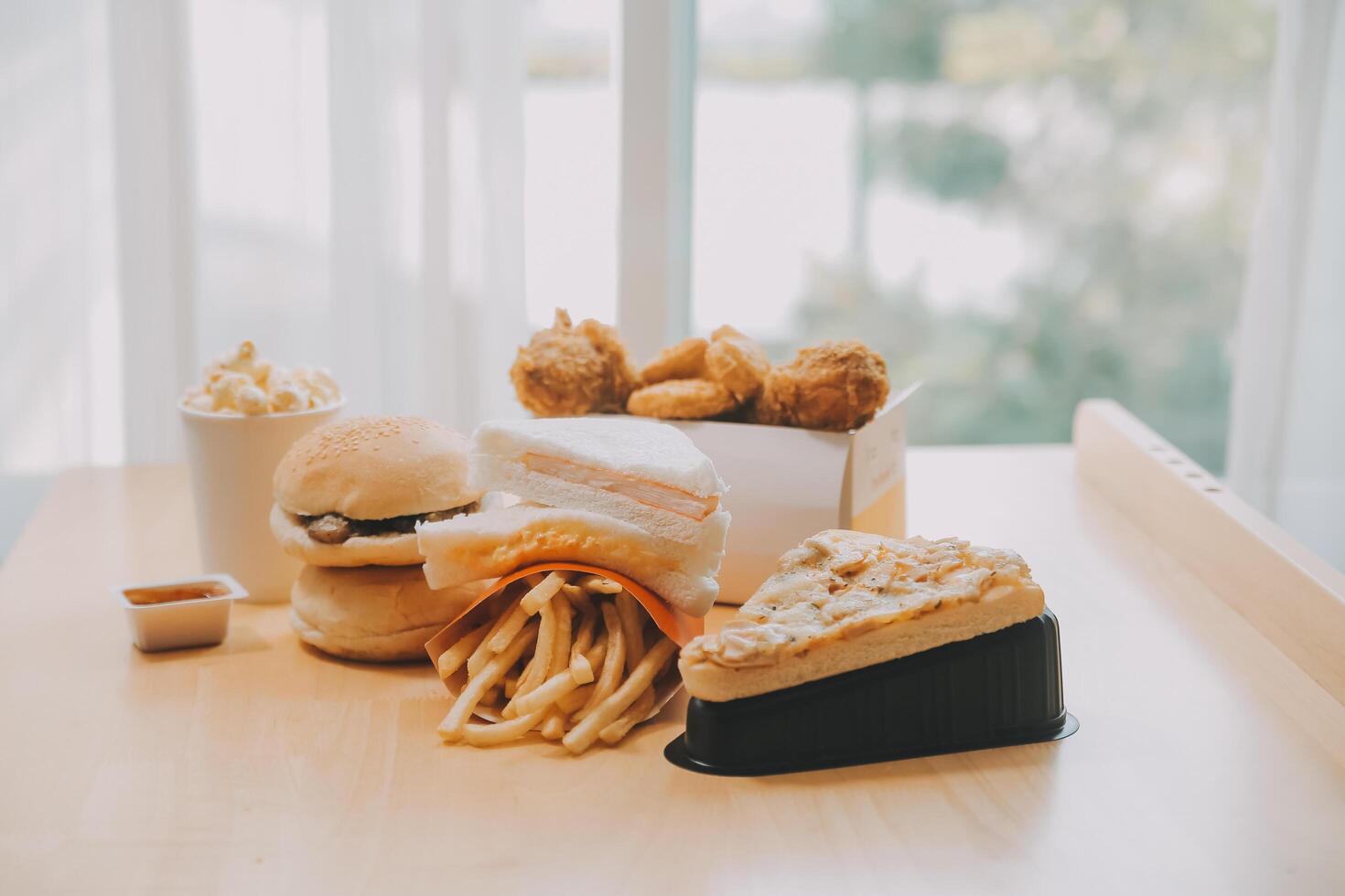 Closeup of home made burgers on wooden background photo