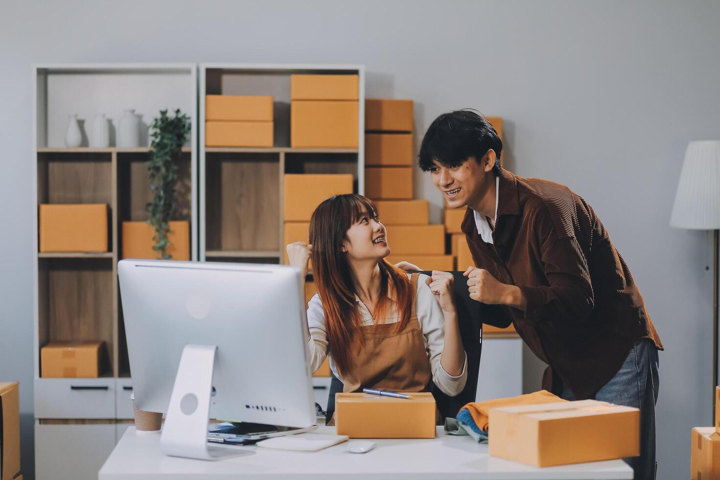 Small business owners couple entrepreneurs working with parcel, e-business, marketing, online shop, sme, entrepreneurs photo