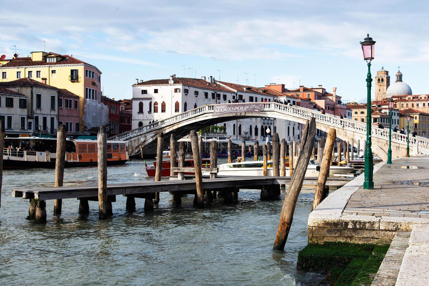 Venice, Italy-April 24, 2024 Scenic Bridge over Venetian Canal photo