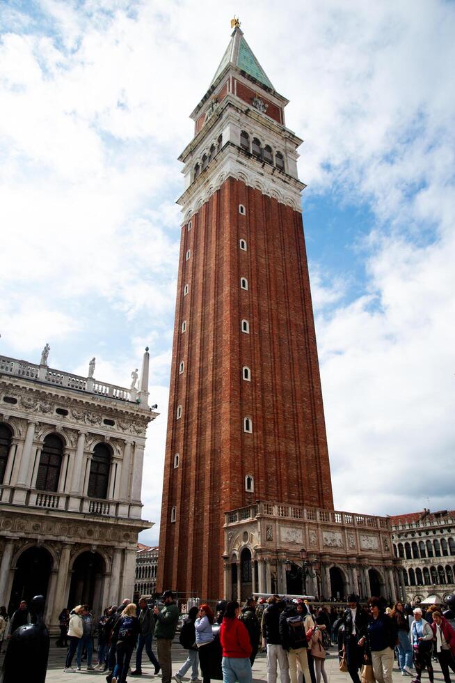 Venice, Italy-April 24, 2024 St. Mark's Campanile in St. Mark's Square photo