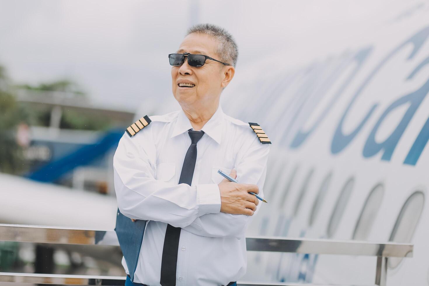 Professional pilot woman in uniform has teamwork meeting for success flight in aviation business. Young female captain instructor sitting in office and working or training commercial airline crew. photo