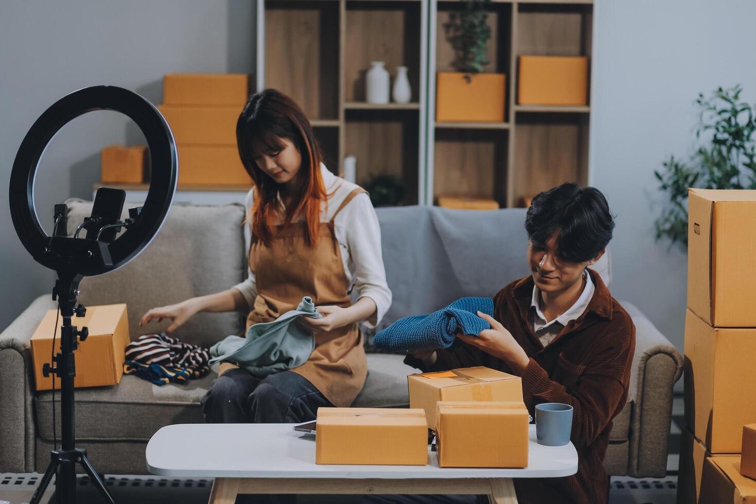 Small business owners couple entrepreneurs working with parcel, e-business, marketing, online shop, sme, entrepreneurs photo