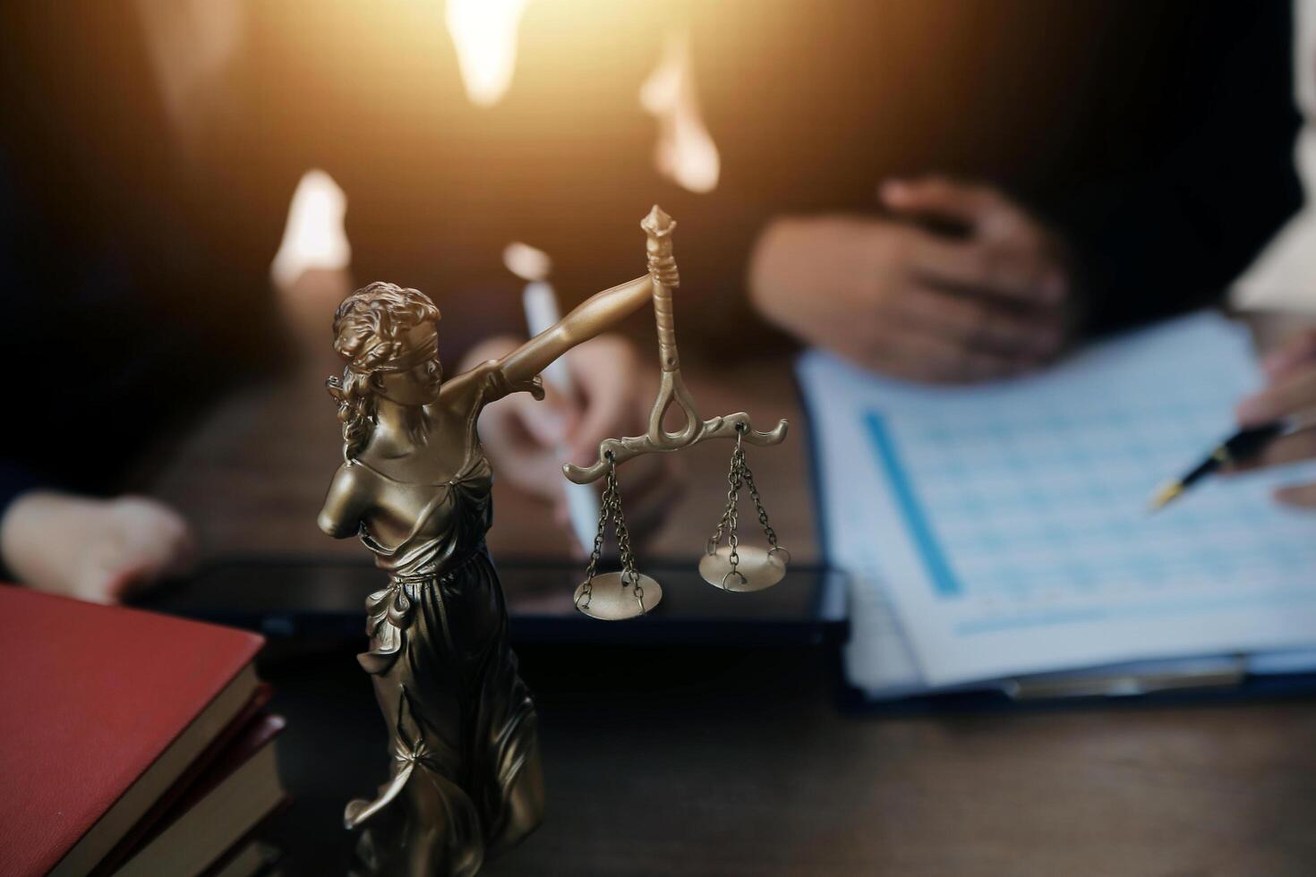 Lawyer, legal advisor, businessman brainstorming information on agreement details Business contracts in legal processing books for accuracy in contract documents. joint financial investment. photo