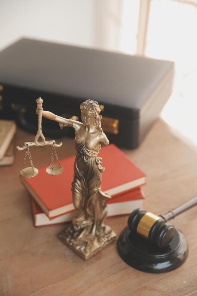 Lawyer, legal advisor, businessman brainstorming information on agreement details Business contracts in legal processing books for accuracy in contract documents. joint financial investment. photo