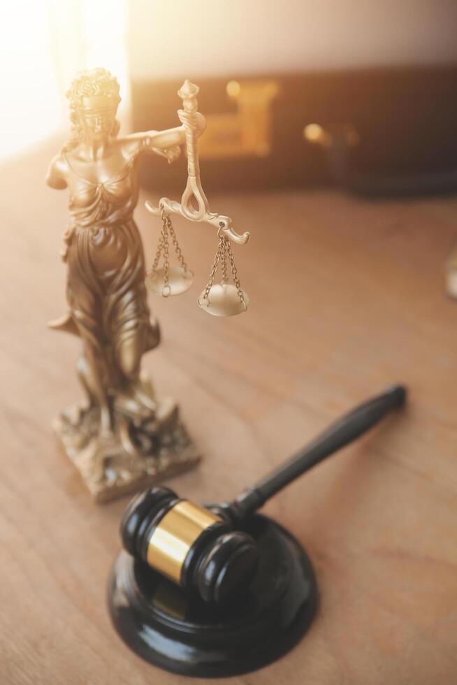 Lawyer, legal advisor, businessman brainstorming information on agreement details Business contracts in legal processing books for accuracy in contract documents. joint financial investment. photo