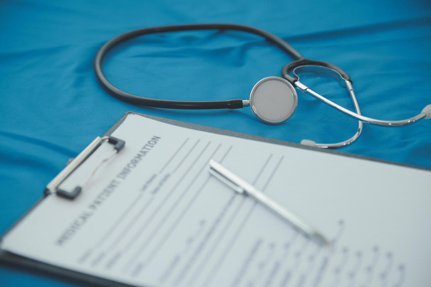 In a hospital setting, the presence of a doctor's physician book and stethoscope carries with it an air of professionalism and dedication to patient care. photo