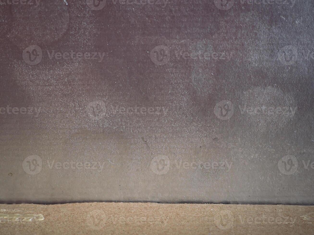 Silver painted cardboard surface for copy space. photo