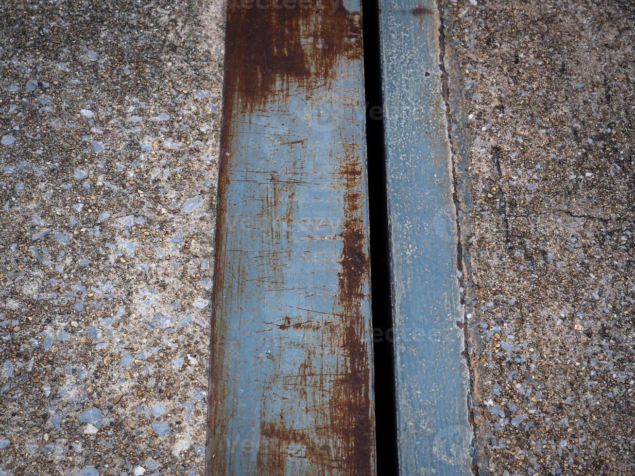 Old iron on the floor of a building photo