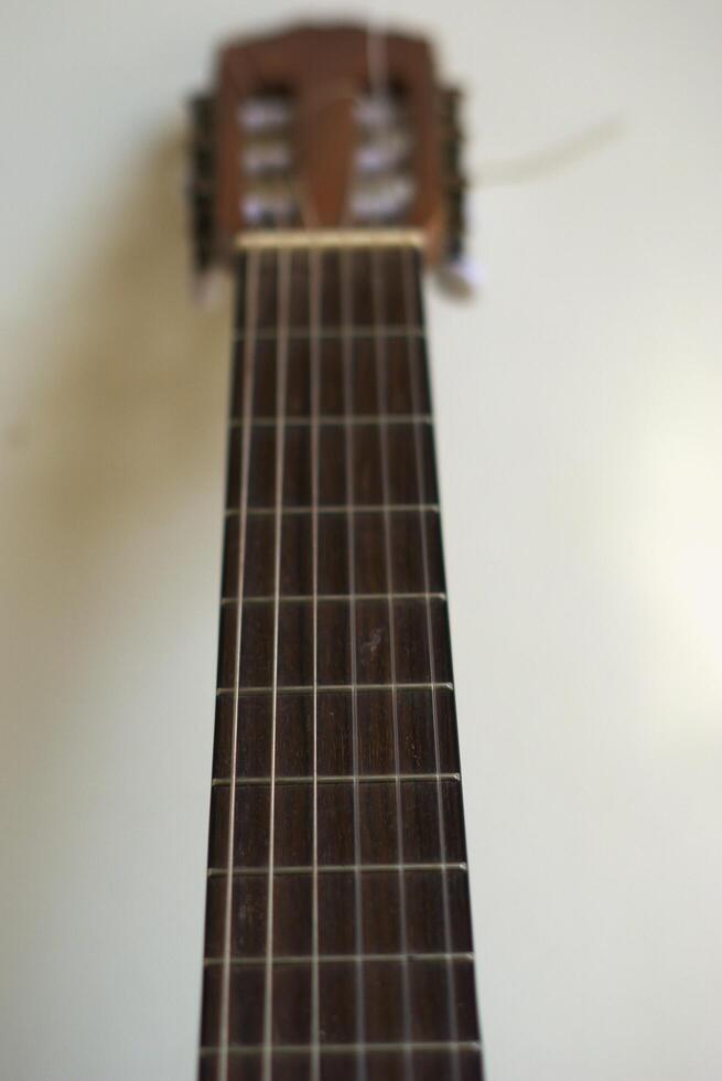 Selective focus of guitar strings photo