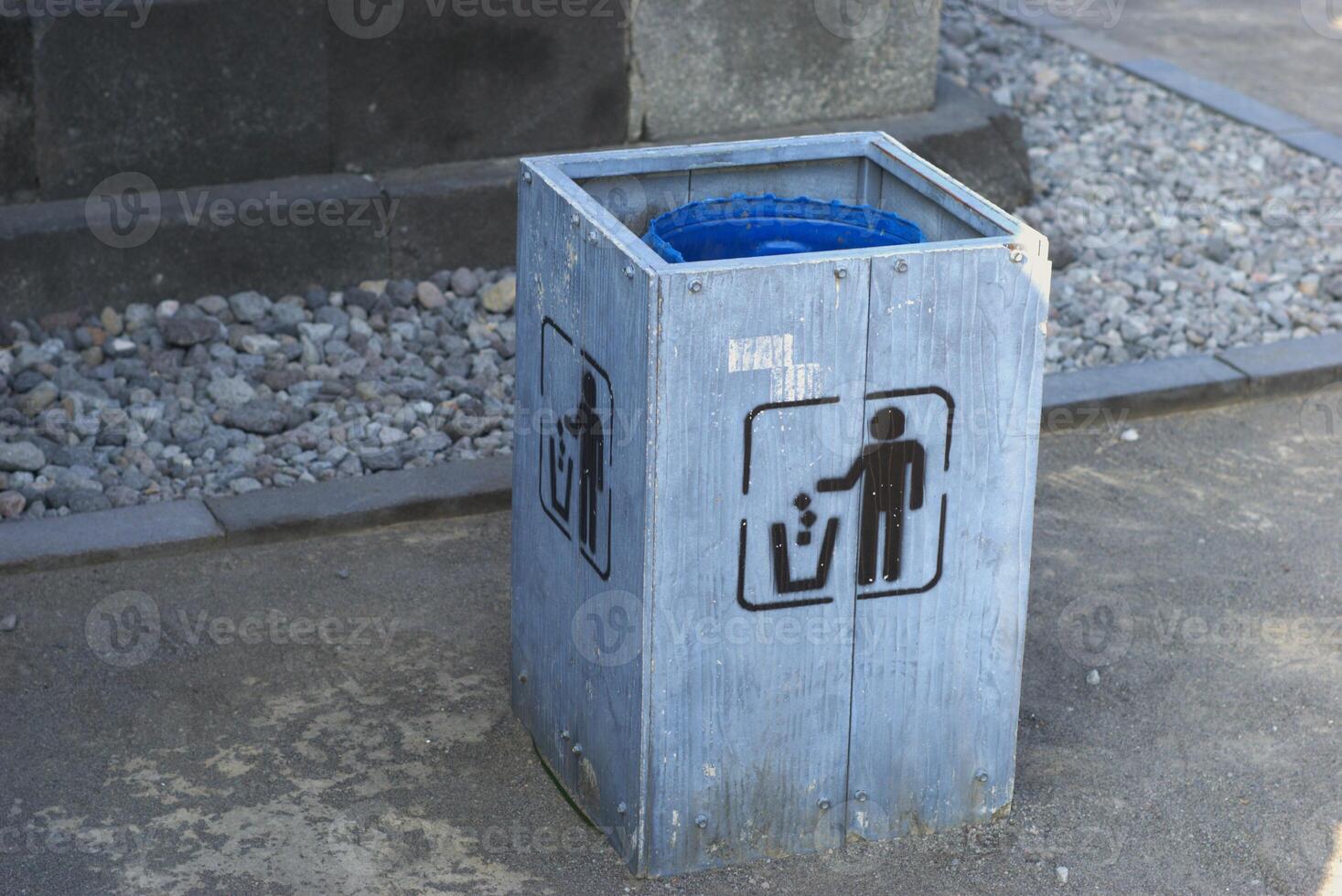 garbage bin in the park photo