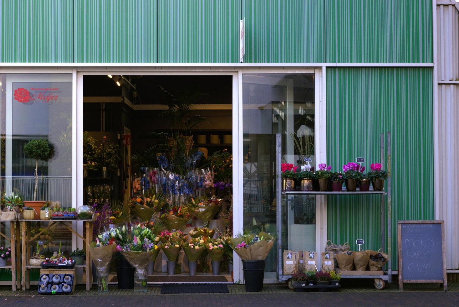 front door of a flower shop, Zaandam, The Netherlands - April, 06, 2022 photo