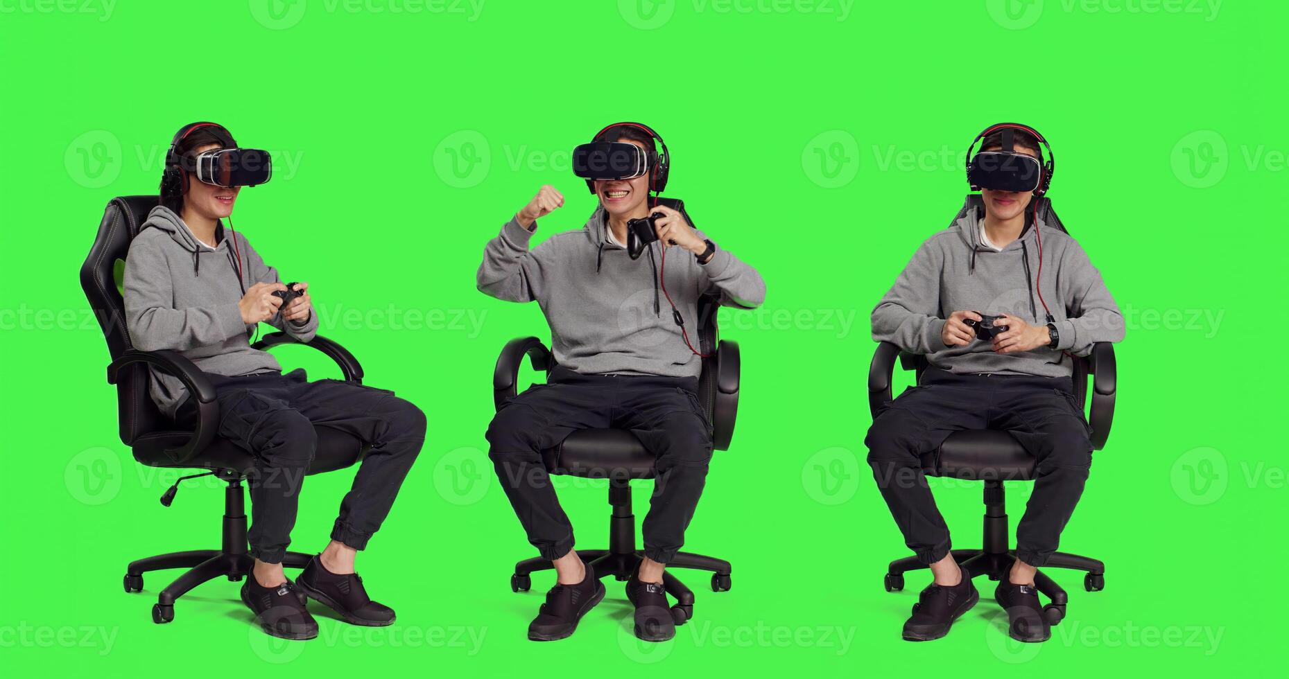 Man engages in internet gameplay clash with friends while playing games using mobile devices against greenscreen backdrop. With virtual reality glasses, person looks confident. photo