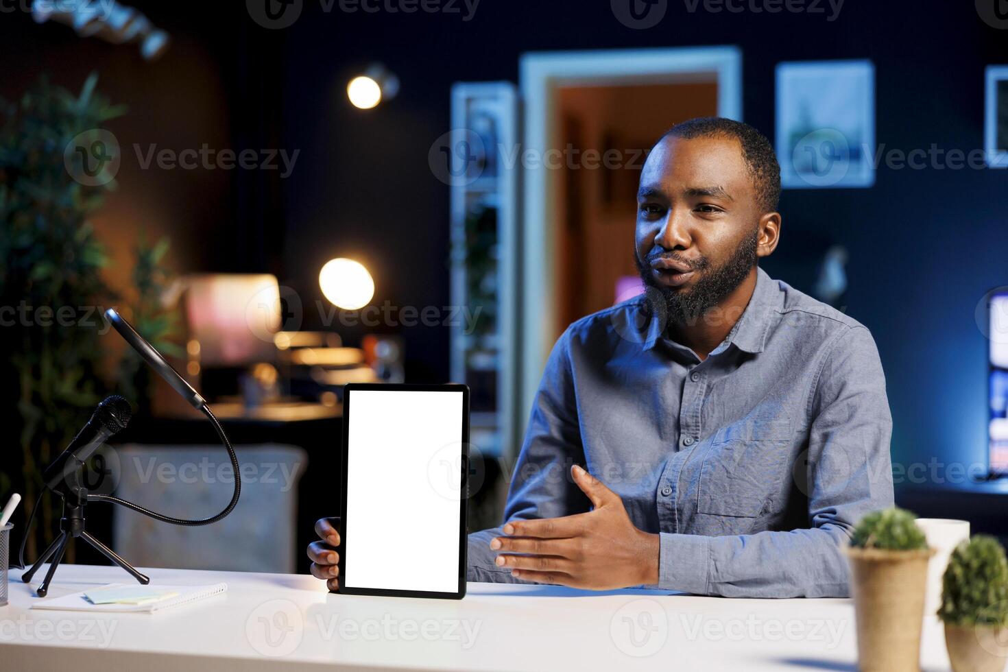Tech guru excited to review newly released mockup tablet, comparing features with older models. Influencer filming for social media, analyzing latest generation of isolated screen digital device photo