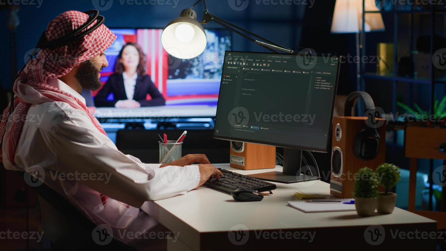 Qualified arab programmer writing code on computer screen while in office using Java programming languages. Middle Eastern Developer working on fixing database errors while working from home photo