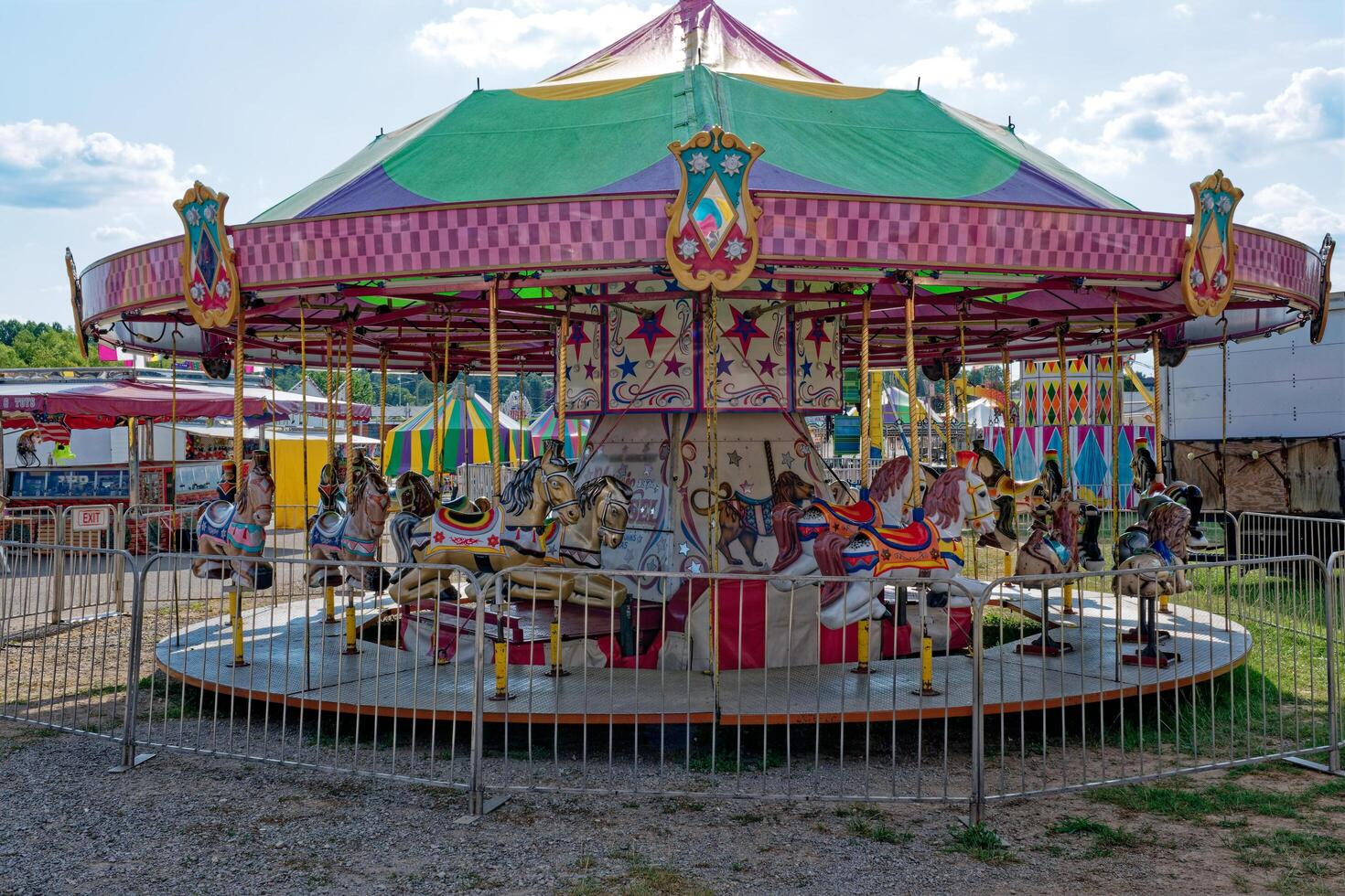Vintage Merry go around carnival ride at the fair photo