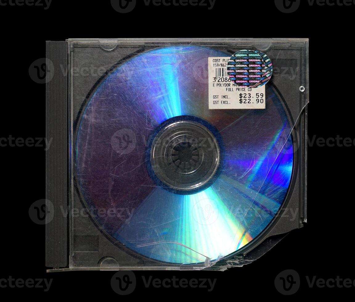 Cracked, smashed, damaged cd case isolated on black background. cd mockup photo