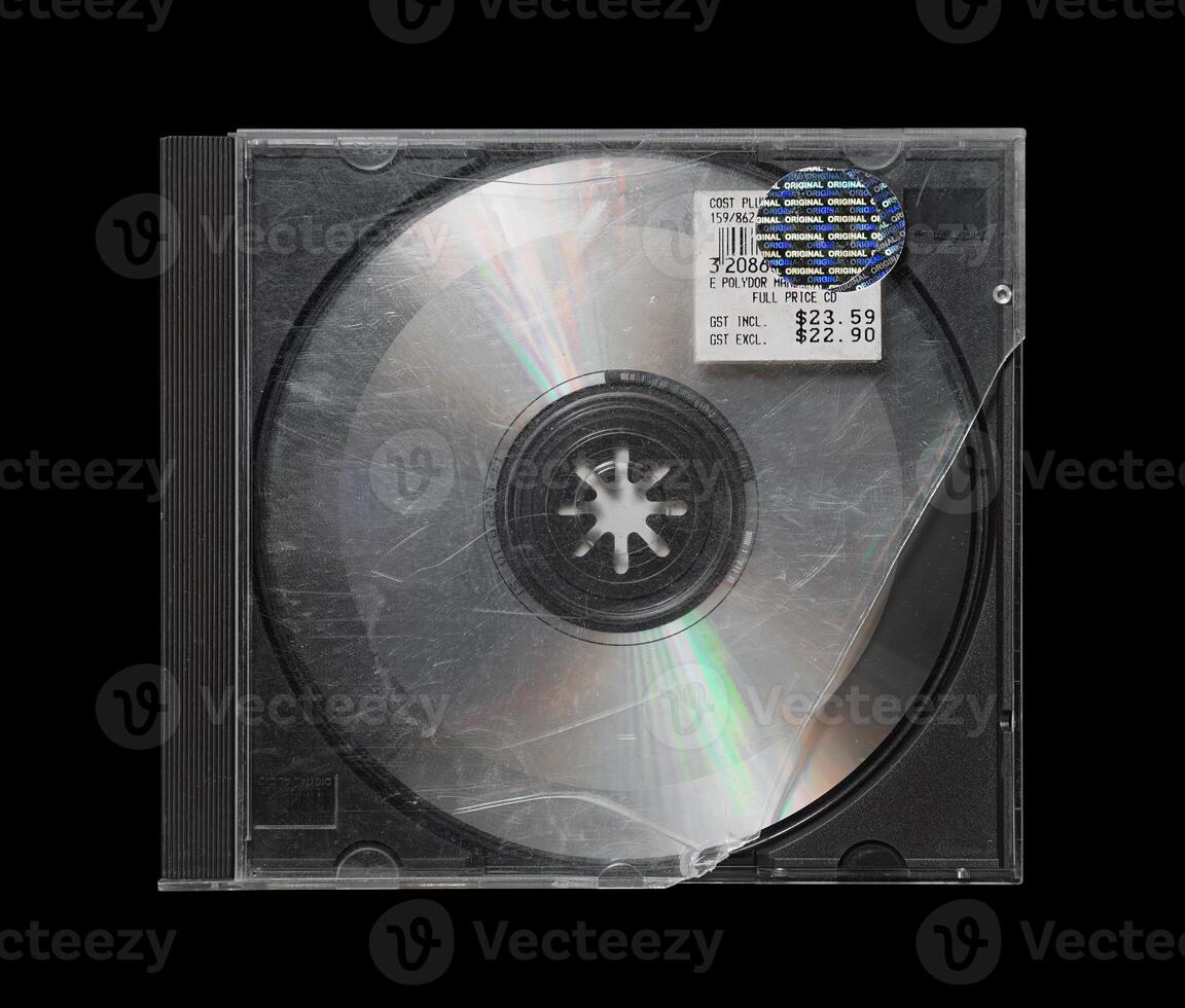 Cracked, smashed, damaged cd case isolated on black background. cd mockup photo