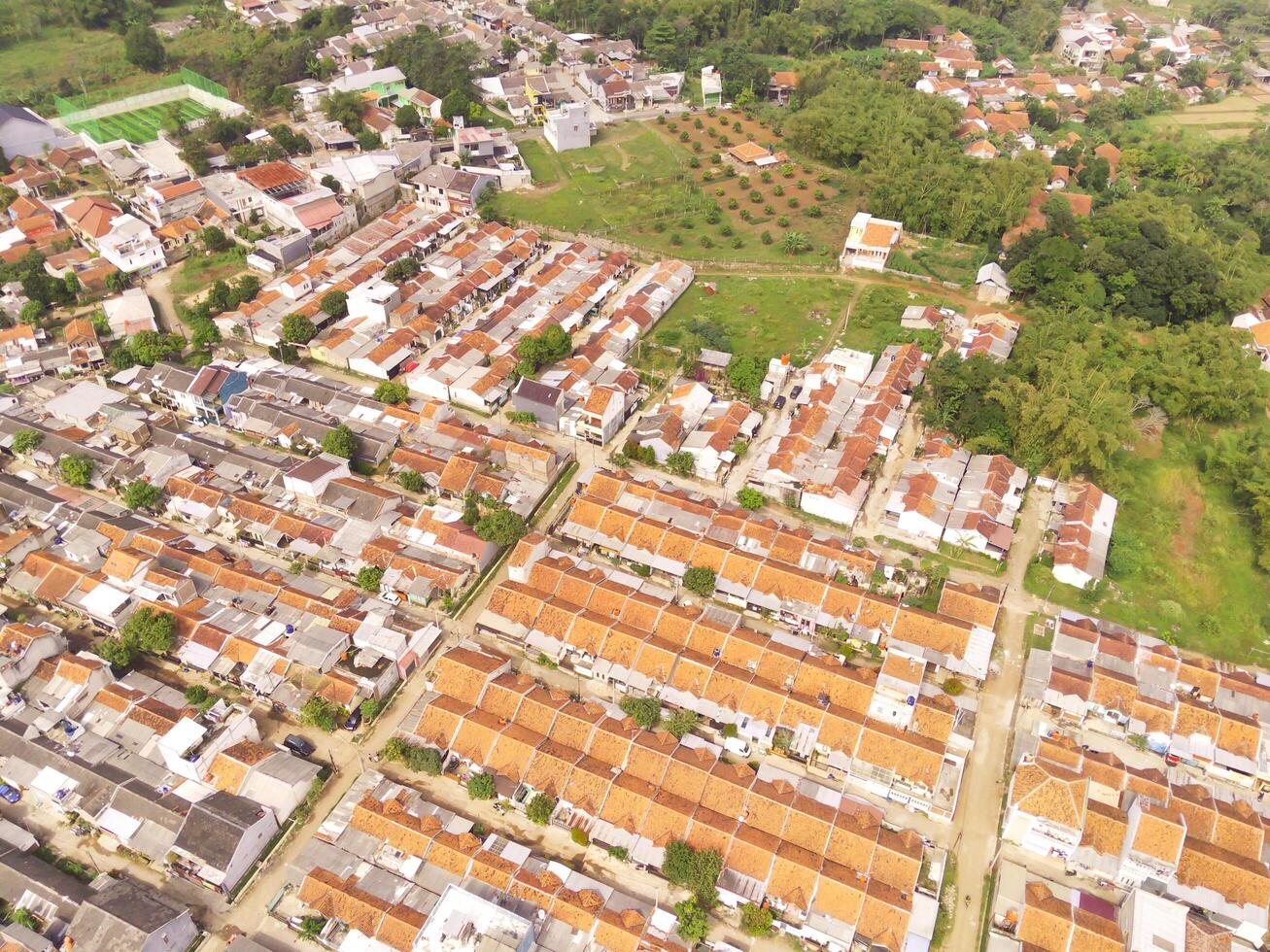 Overhead view of dense housing in Cikancung, West Java - Indonesia. Housing Industry. Panoramic Landscape. Graphic Resources. Social issues. Wallpapers Backgrounds. Aerial Landscape Photography photo
