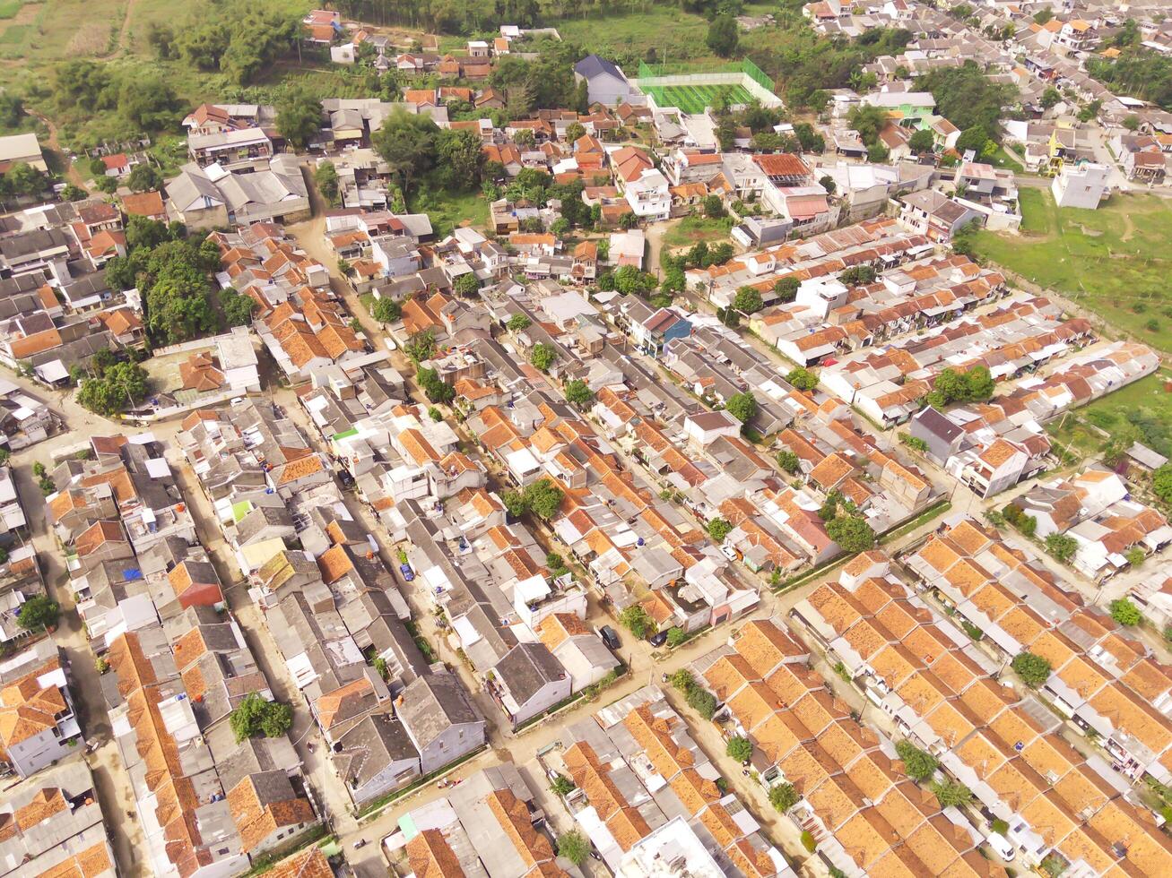Overhead view of dense housing in Cikancung, West Java - Indonesia. Housing Industry. Panoramic Landscape. Graphic Resources. Social issues. Wallpapers Backgrounds. Aerial Landscape Photography photo
