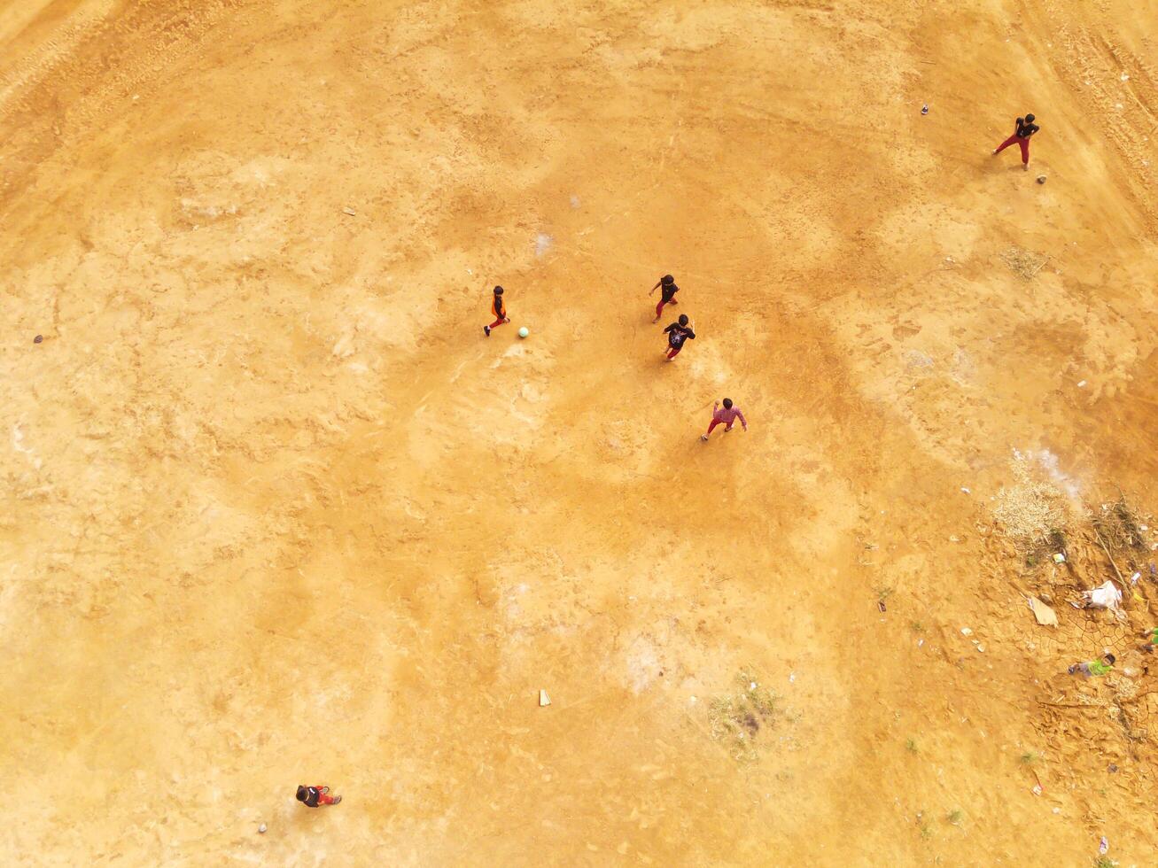 Aerial Landscape of football game on barren field. Sports Industry. Panoramic Landscape. Graphic Resources. Above. Drone Photography. Aerial Landscape Photography Concept photo