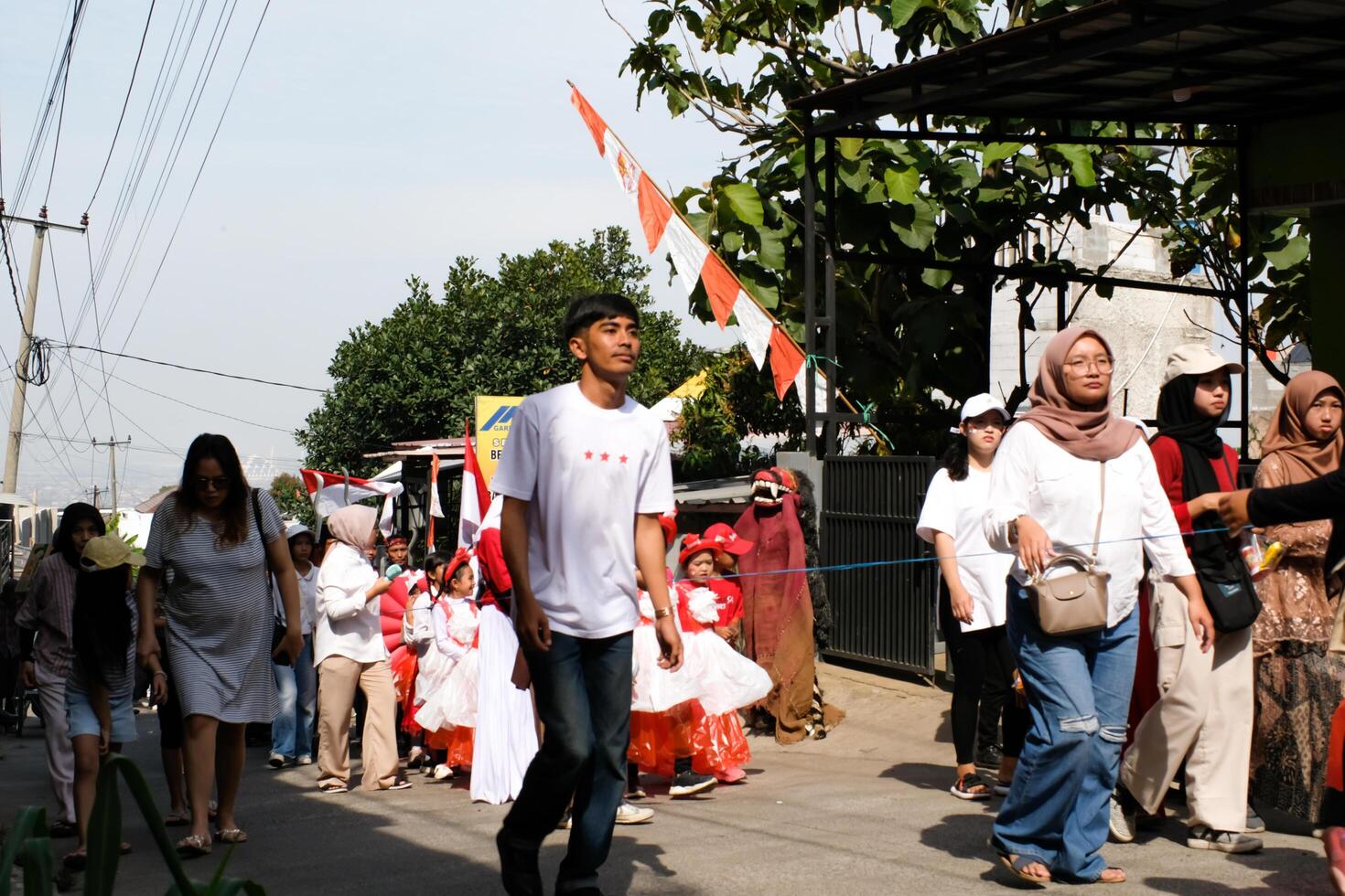 Cibiru, West Java, Indonesia - August 17, 2024. Parade to Celebrate the 79th Anniversary of the Independence Day of the Republic of Indonesia. Attended and celebrated by all levels of society. photo