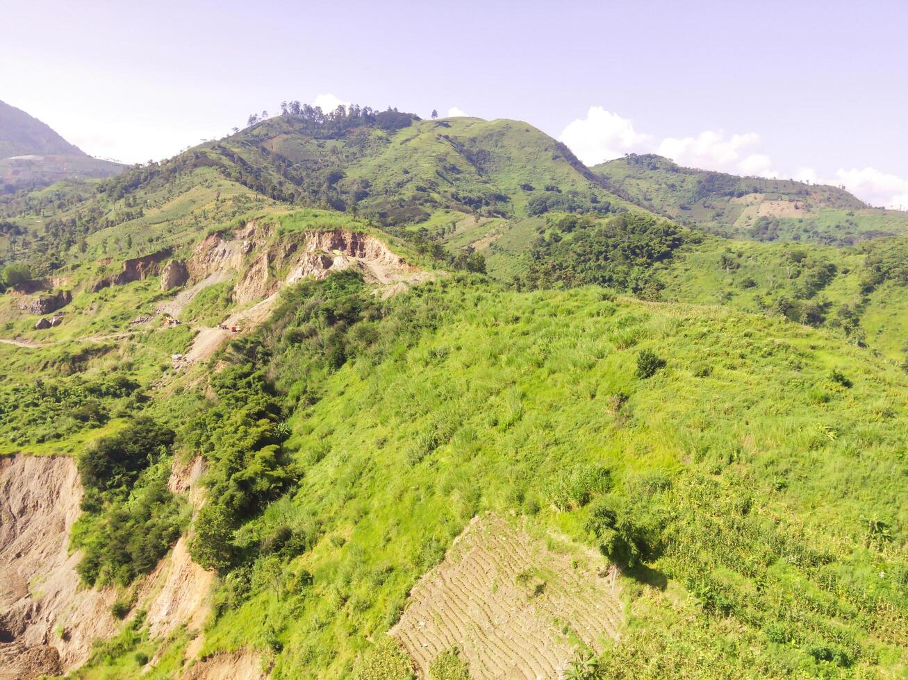 Aerial View of an industrial site on a mountain slope. Mining Industry. Panoramic Landscape. Graphic Resources. Mines and sand pits. Aerial Landscape Photography Concept photo