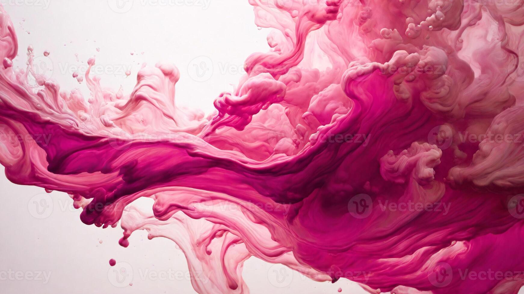 Pink ink spreads in water. photo