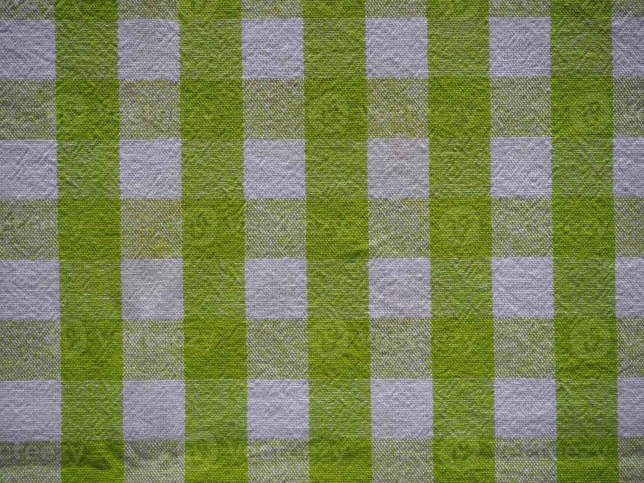 chequered green and white tablecloth fabric texture background photo