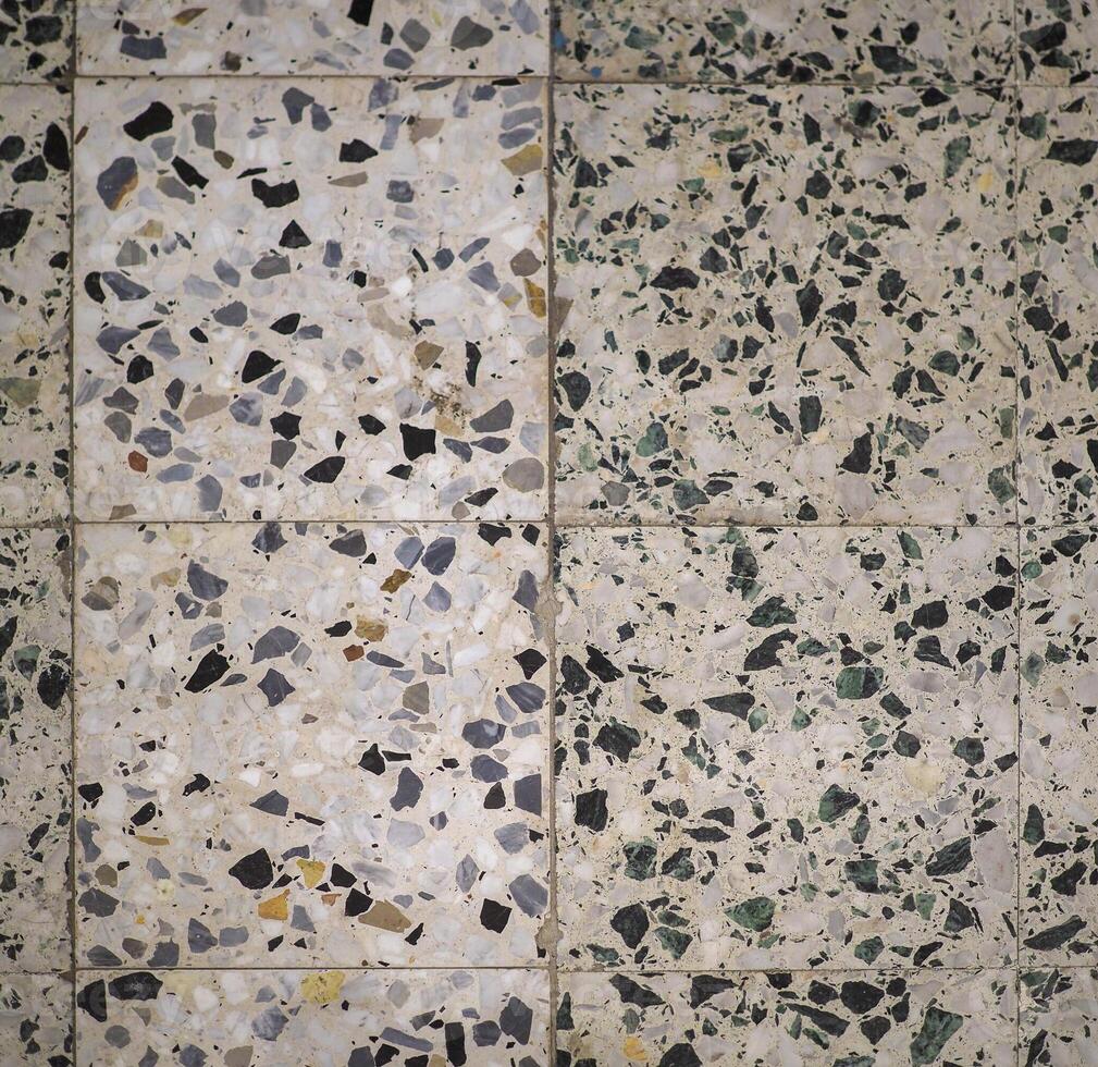 industrial style white and black marble tiled texture background photo