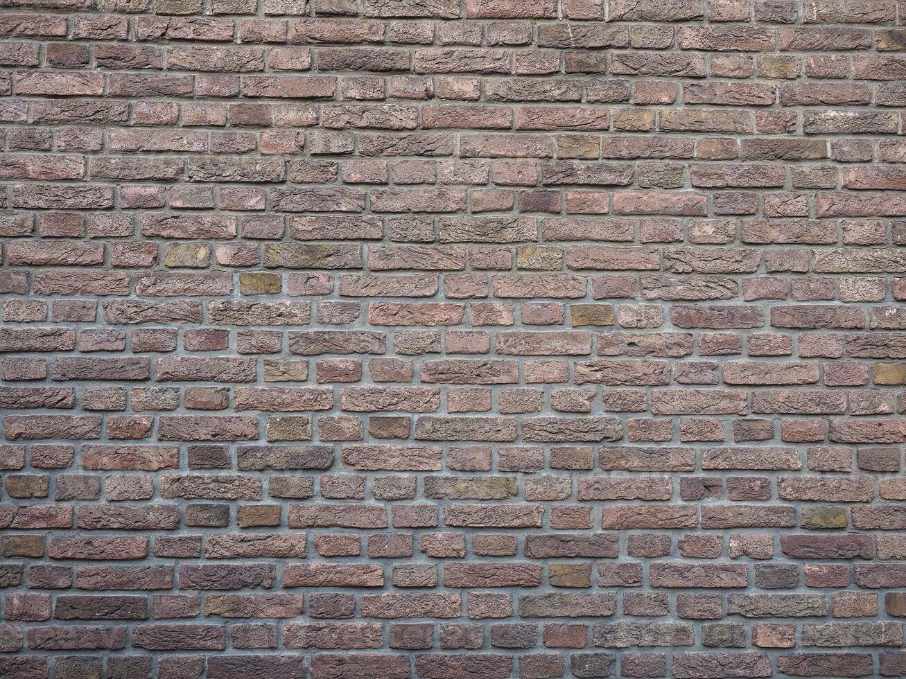 industrial style dark red brick wall background photo