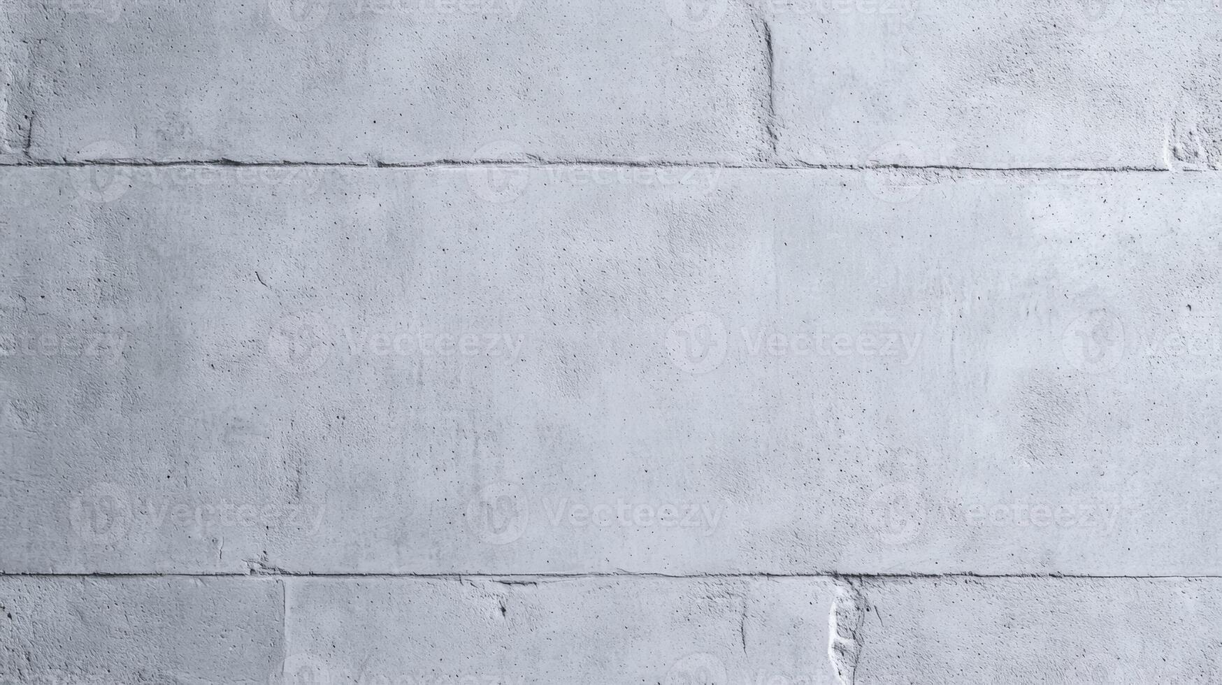 Angled shot of a plain concrete wall slightly textured surface with a uniform gray tone creating a minimalist and timeless background photo